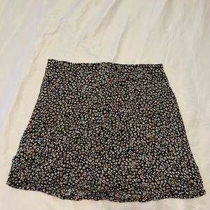 cute skirt pairs really nice with a cute black sweater